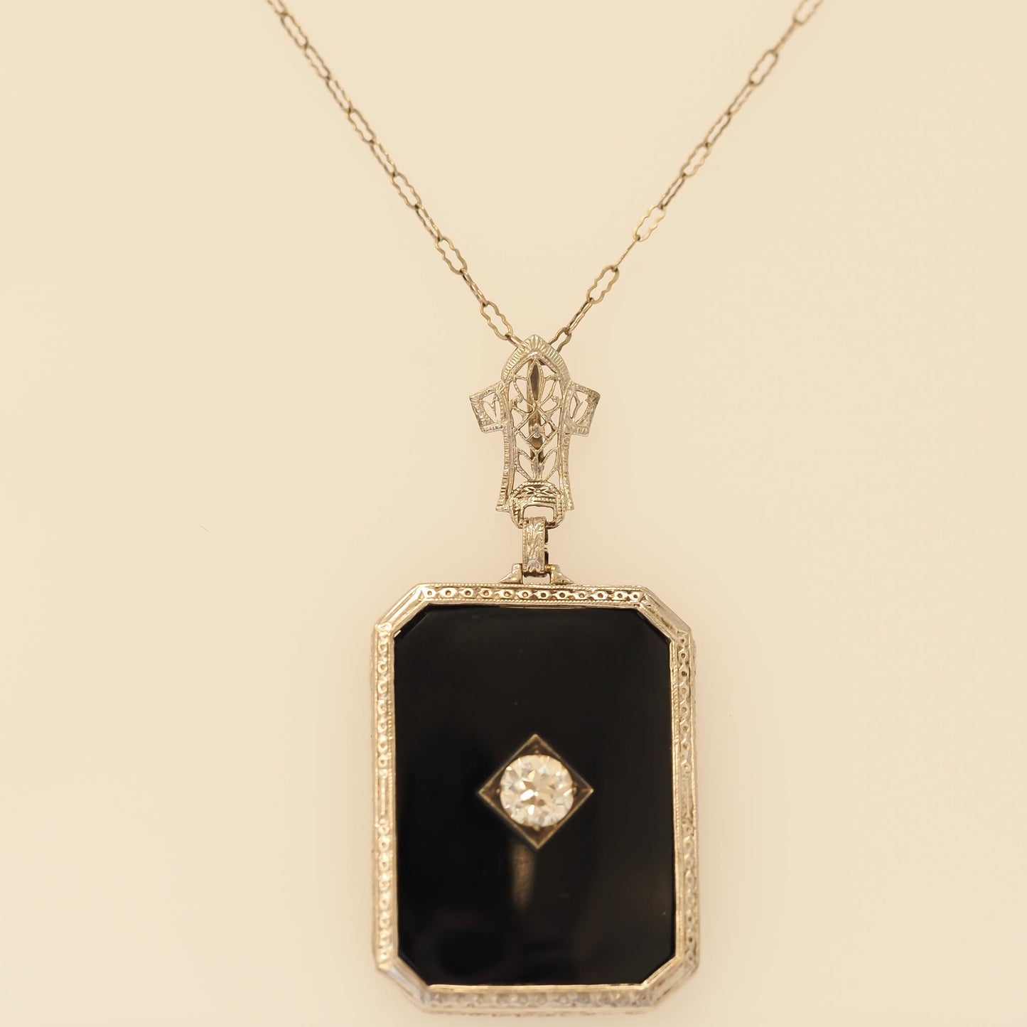 Circa 1920s Art Deco Onyx and .65ct Old European Diamond Necklace Pendant