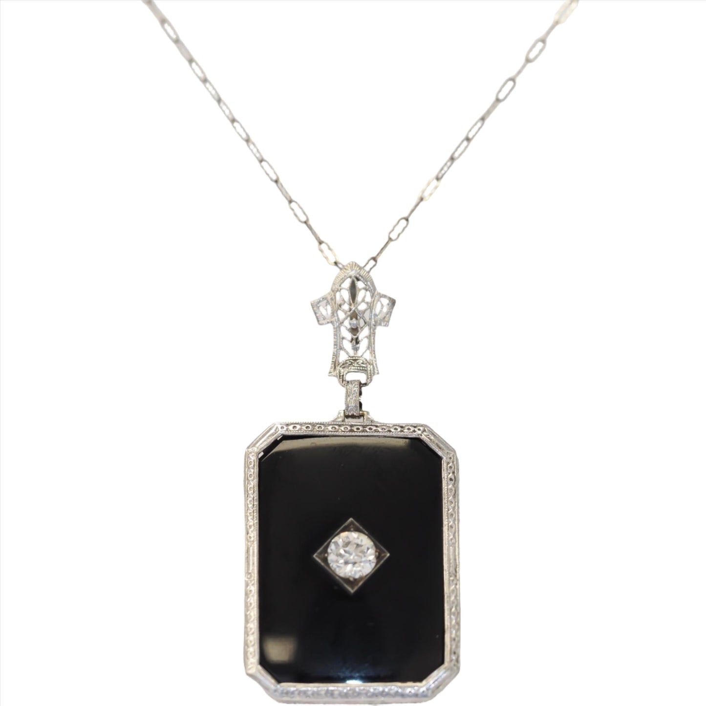 Circa 1920s Art Deco Onyx and .65ct Old European Diamond Necklace Pendant