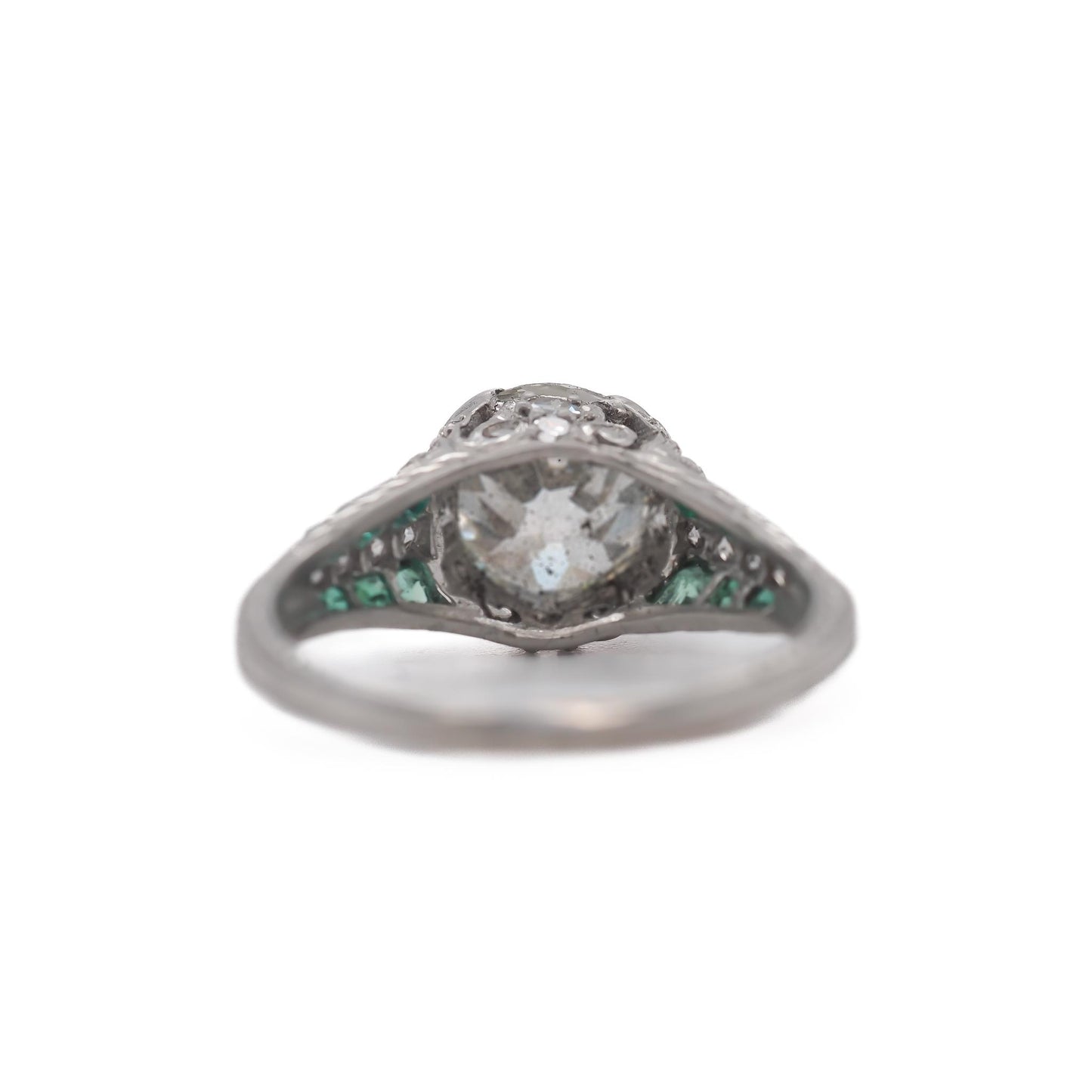 Circa 1920s Platinum 2.03ct Old European Cushion Diamond and Emerald Engagement