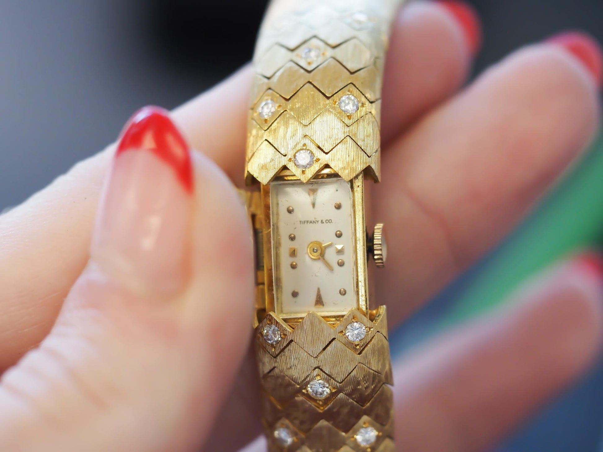 1950s Tiffany & Co. 18K Gold and Diamond  “Peek A Boo” Hidden Watch Bracelet