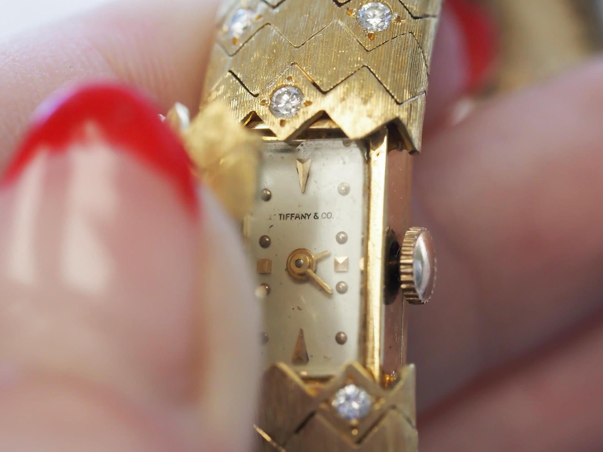 1950s Tiffany & Co. 18K Gold and Diamond  “Peek A Boo” Hidden Watch Bracelet