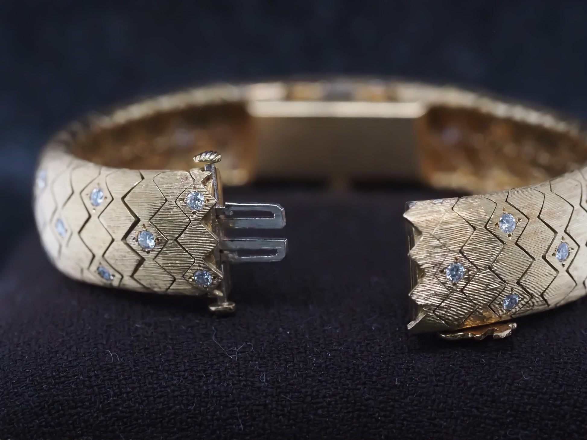 1950s Tiffany & Co. 18K Gold and Diamond  “Peek A Boo” Hidden Watch Bracelet