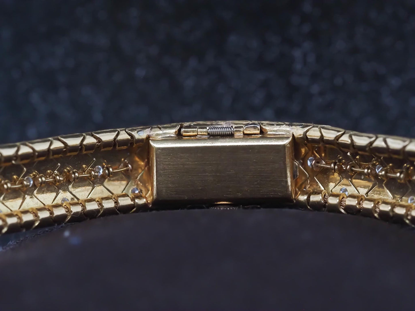 1950s Tiffany & Co. 18K Gold and Diamond  “Peek A Boo” Hidden Watch Bracelet