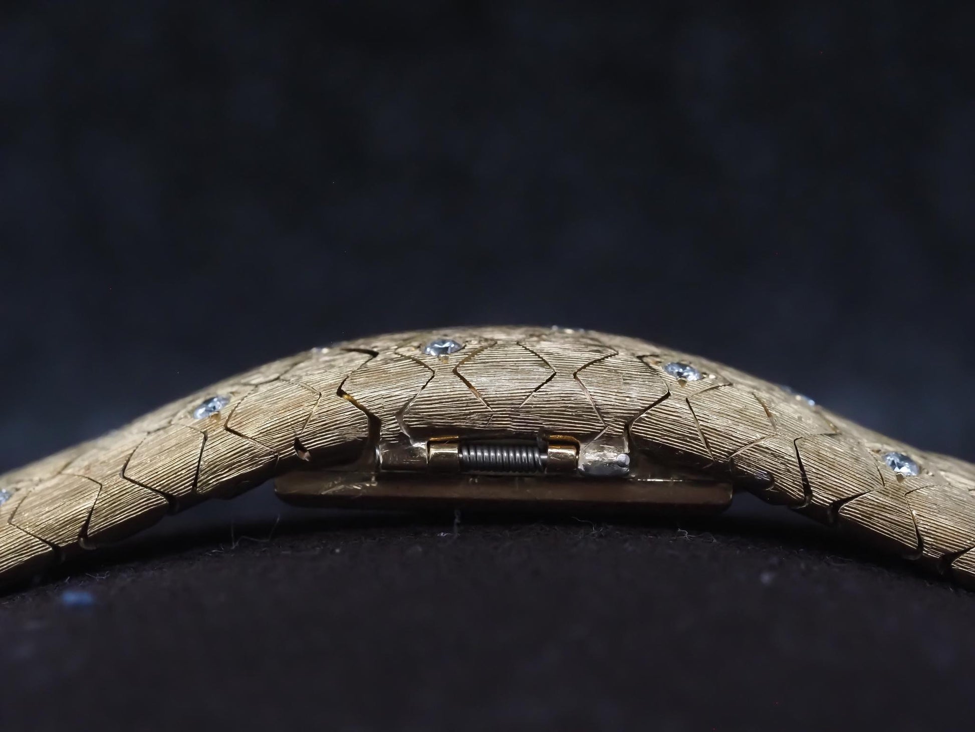 1950s Tiffany & Co. 18K Gold and Diamond  “Peek A Boo” Hidden Watch Bracelet