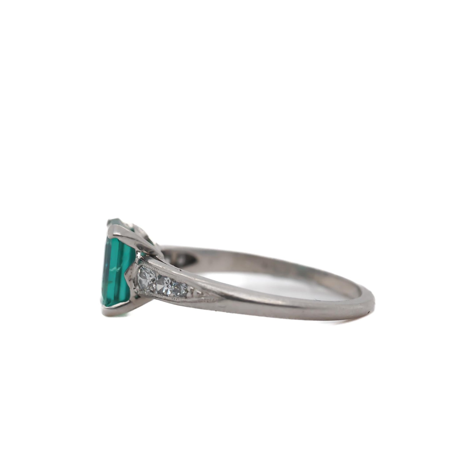 Circa 1920s Platinum Art Deco Emerald and Diamond Engagement Ring