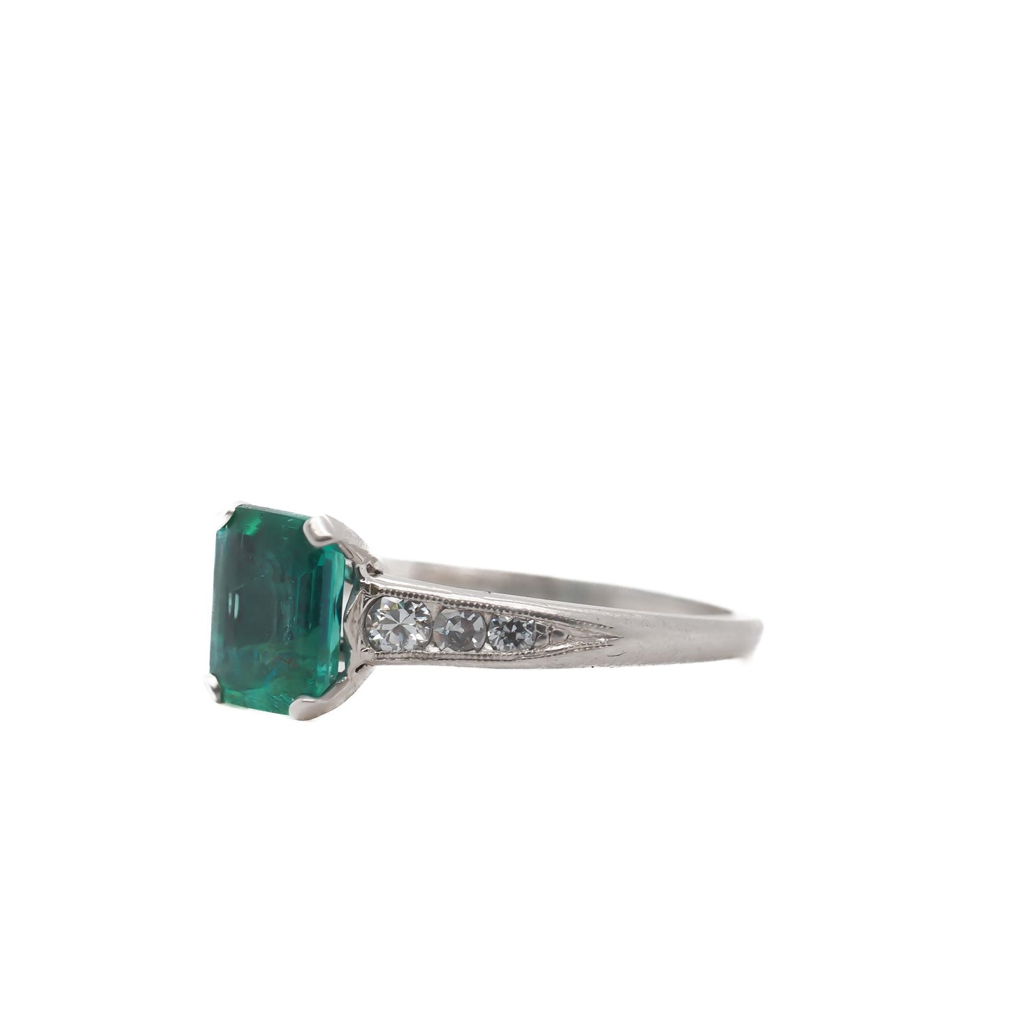 Circa 1920s Platinum Art Deco Emerald and Diamond Engagement Ring