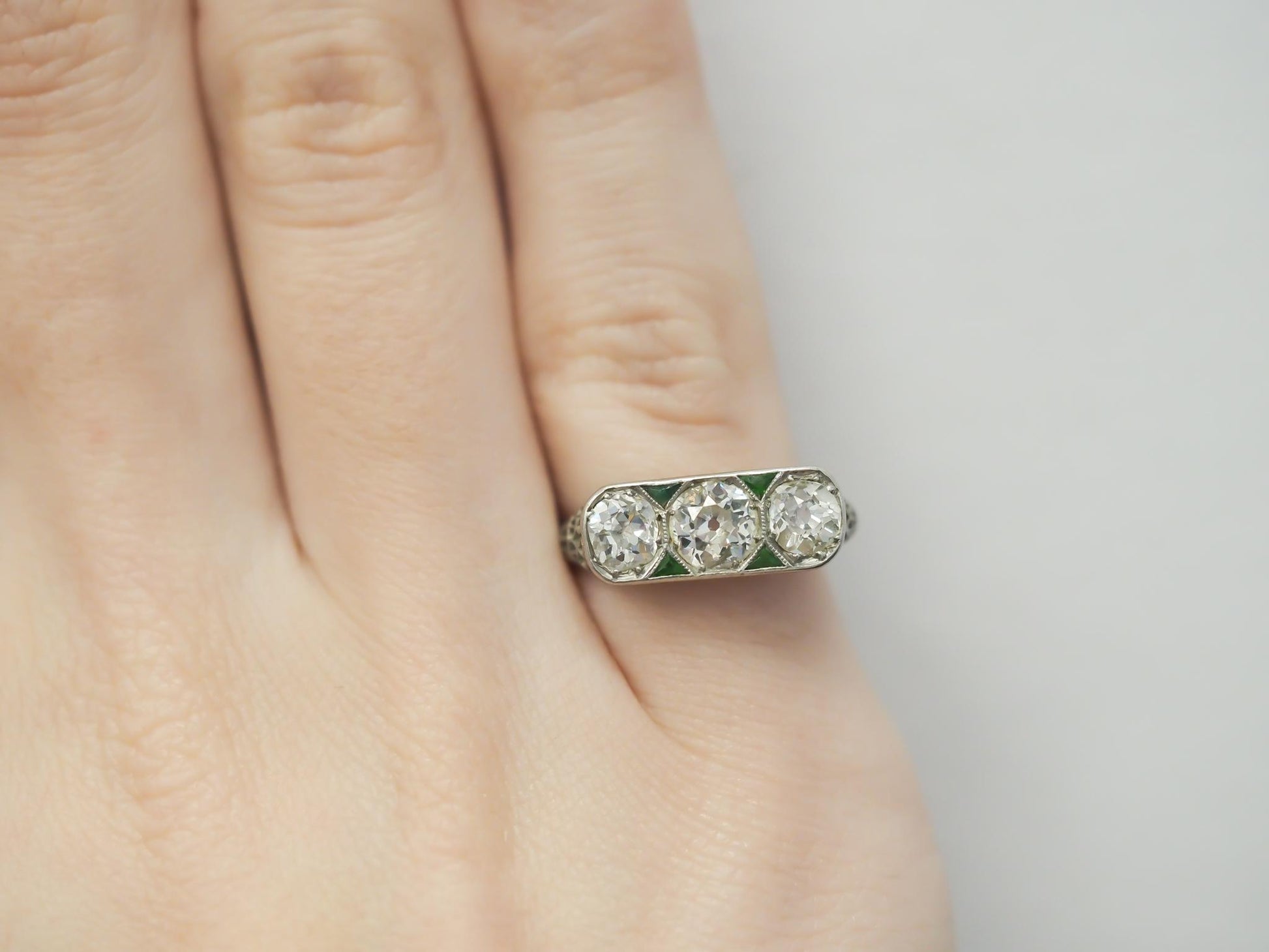 Circa 1920s Old European 3 Stone Diamond and Emerald Engagement Ring