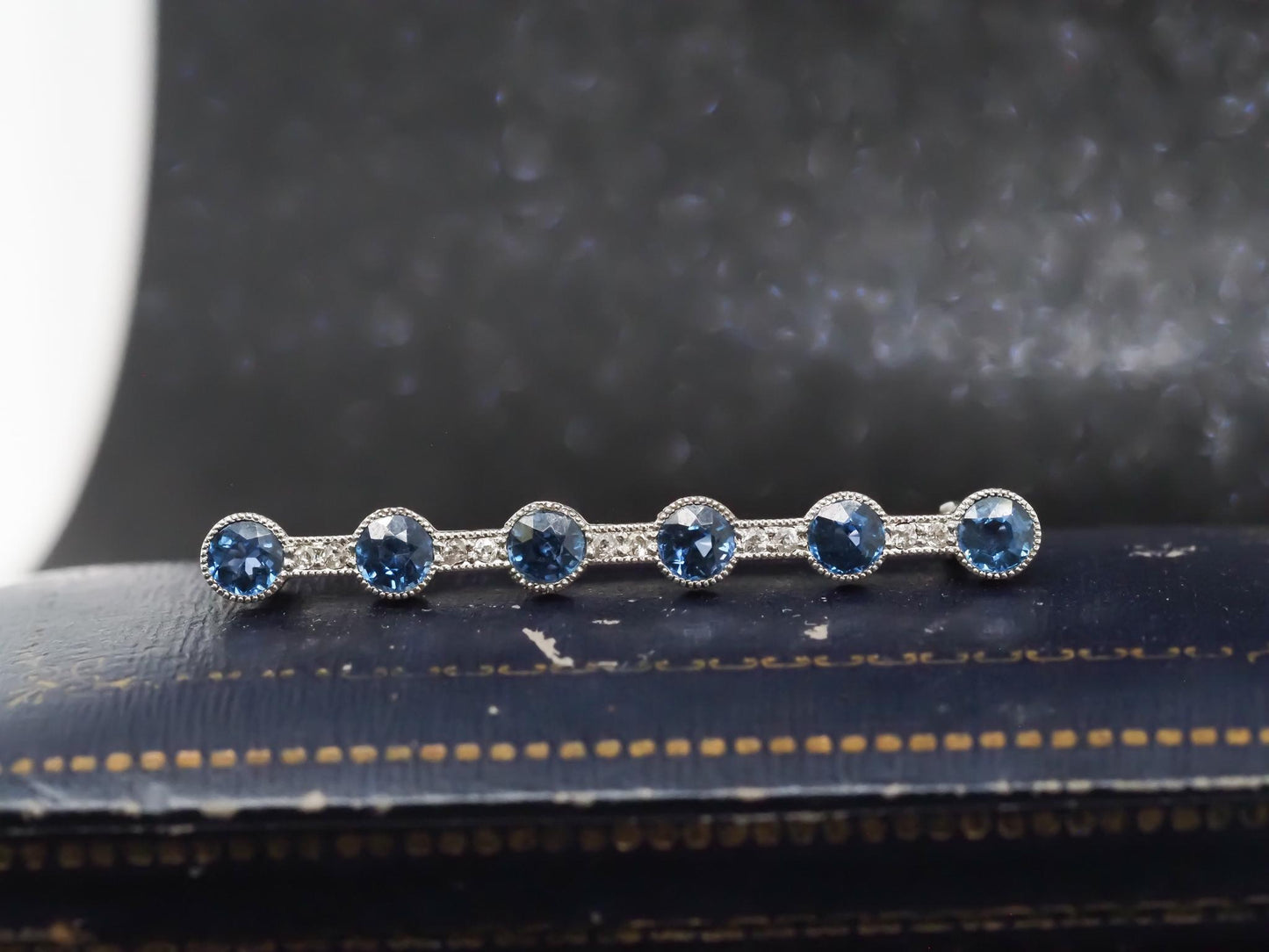 Estate Art Deco Platinum YOGO Sapphire and Diamond Line Brooch